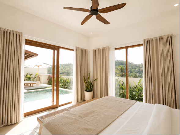 Bedroom looking out to the pool