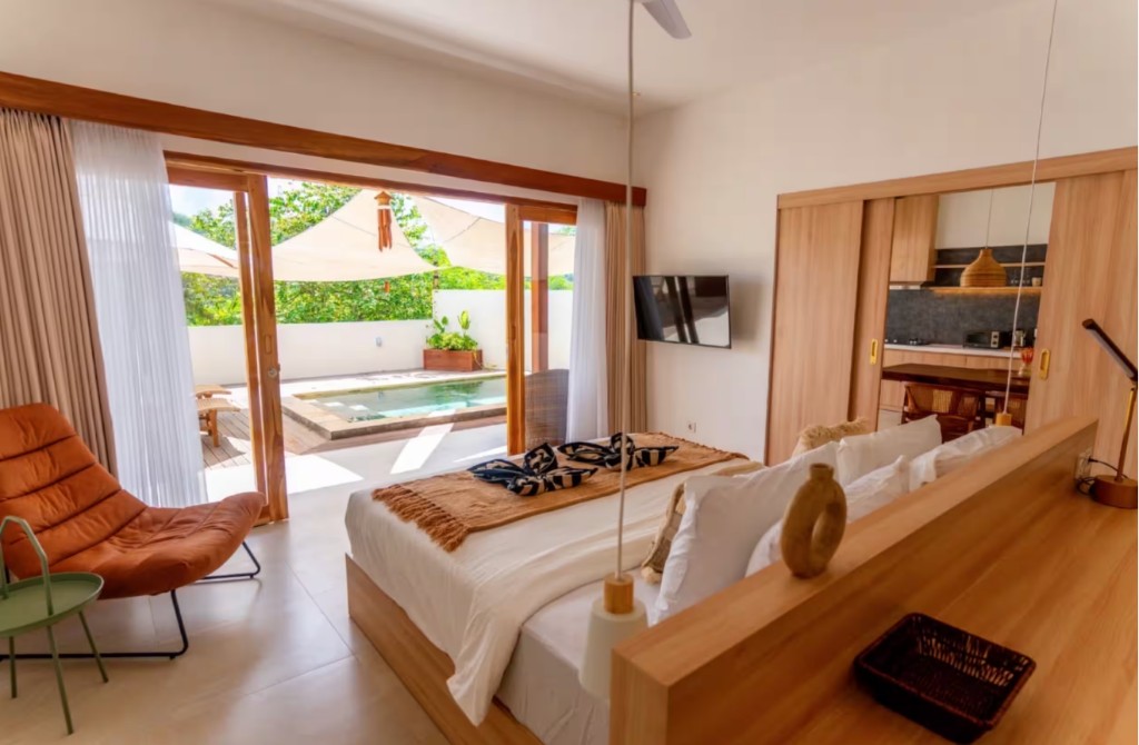 Bedroom opening to the pool terrace